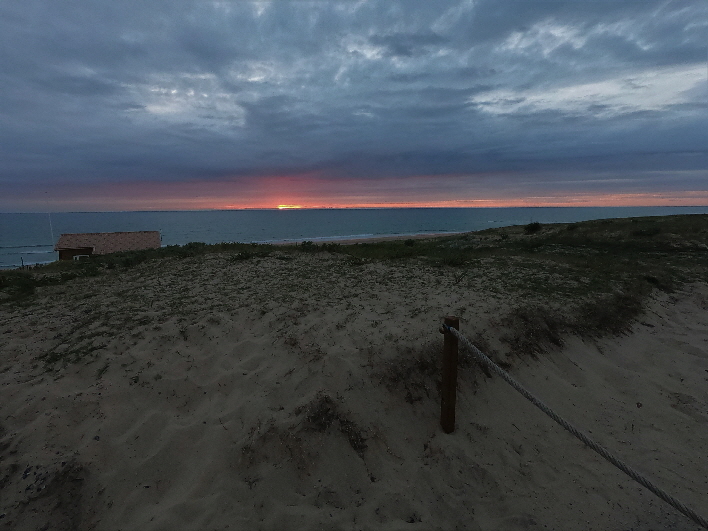 Strand vom CP Arna(.com) mit Sonnenuntergang